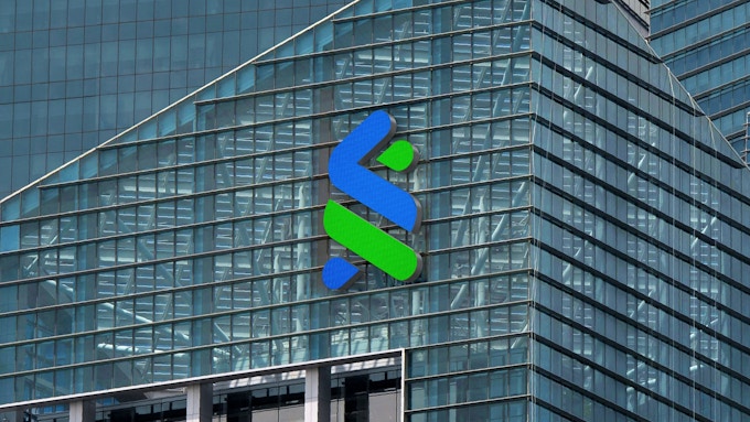 Standard Chartered symbol on bank branch, acting as a beacon to drive recognition